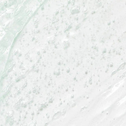 Beauty of Joseon Green Plum Refreshing Cleanser 100ml - A close-up texture shot of a translucent, milky white cosmetic gel or serum with fine bubbles and a soft, glossy sheen -Kbeauty Korean skincare Europe fast delivery - Skincare coréenne SKINOREA shop Paris France livraison rapide 